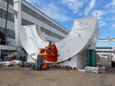 Herrenknecht crews working on the lower half of the tunnel boring machine forward shield on Scarborough Subway Extension Project