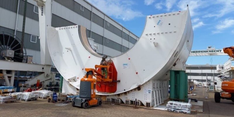 Herrenknecht crews working on the lower half of the tunnel boring machine forward shield on Scarborough Subway Extension Project