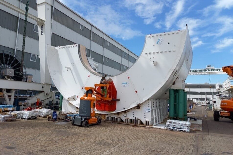 Herrenknecht crews working on the lower half of the tunnel boring machine forward shield on Scarborough Subway Extension Project